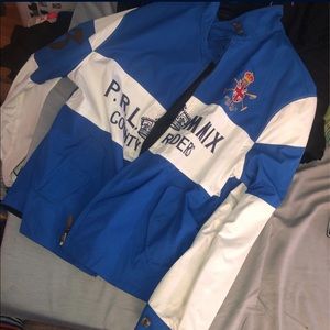 Large reversible polo jacket.